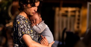 woman with small baby