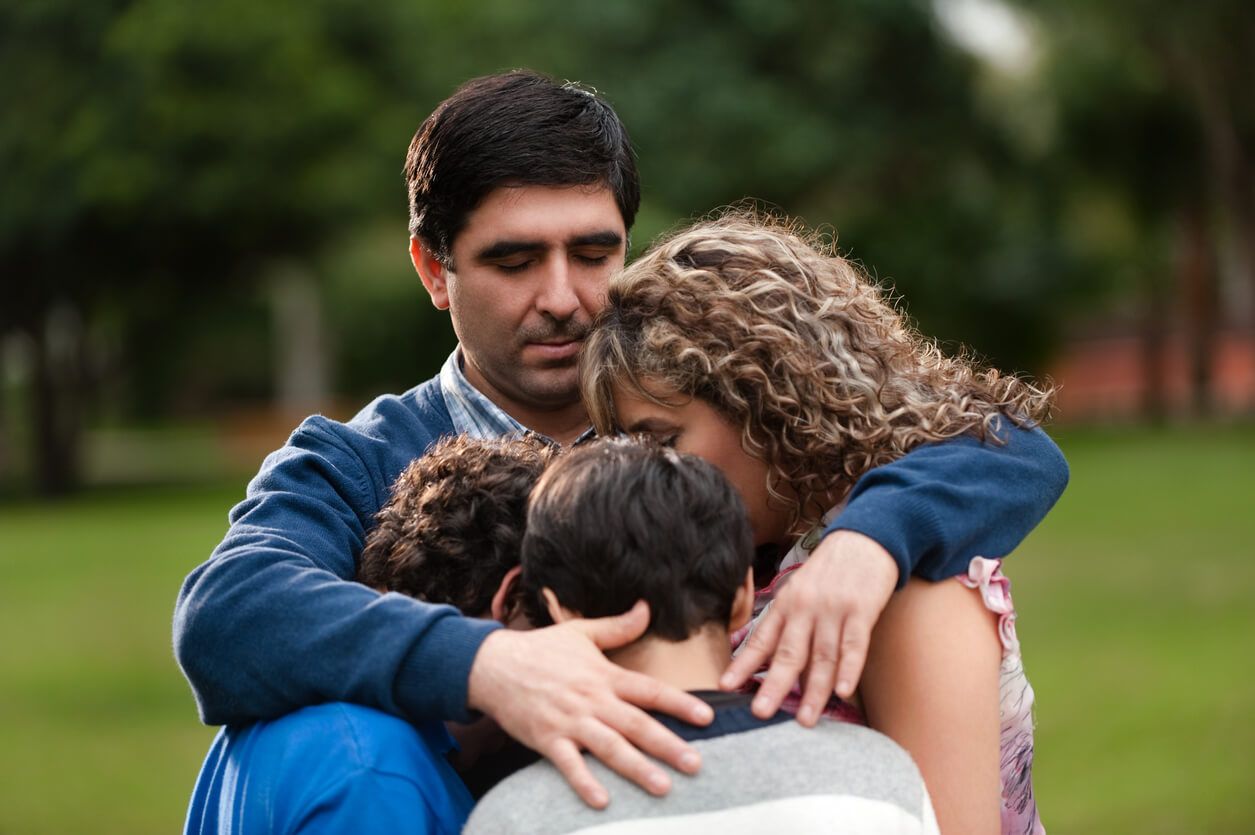 family holding each other