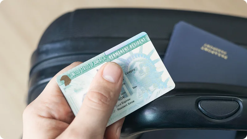 A hand holding card.